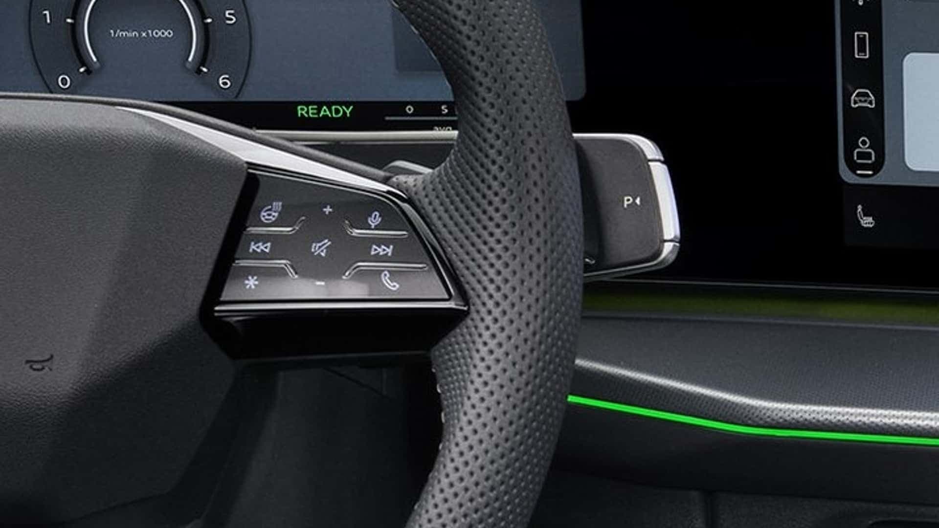 Místo ovládání stěračů je u Audi Q3 (2026) vpravo volič jízdních režimů | foto: Audi 