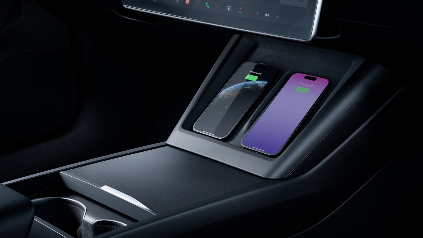 Bezdrátové nabíjení mobilních telefonů v autě Tesla | foto: Tesla