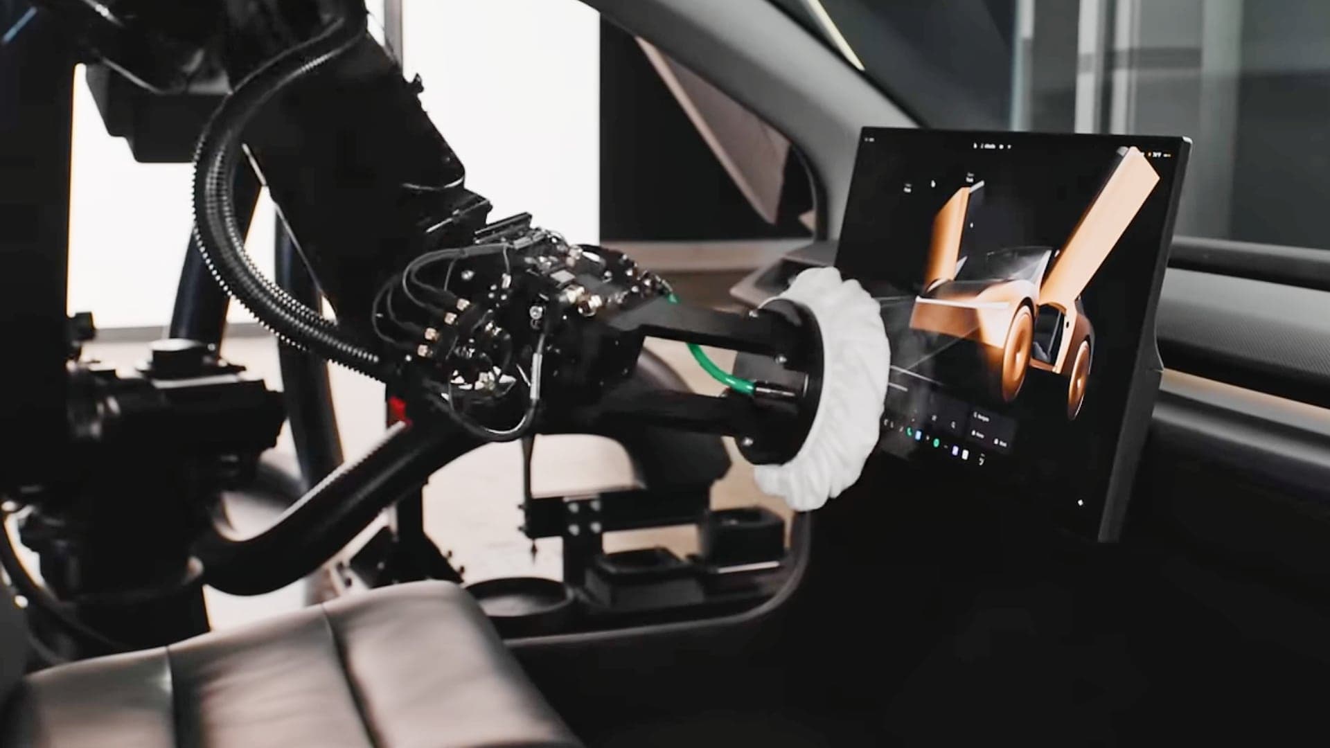 Robot od Tesly pro čištění auta Cybercab | foto: Tesla